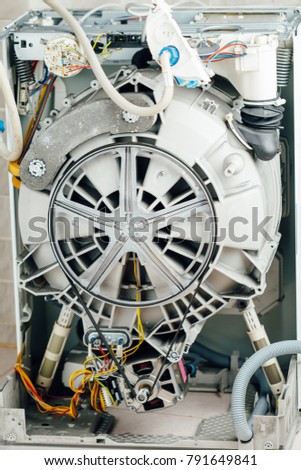 washing machine with open enclosure is ready for service
