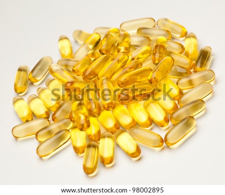 omega-3 fish fat oil capsules, isolated on a white