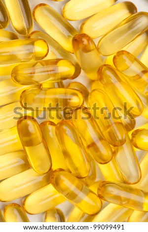 omega-3 fish fat oil capsules background
