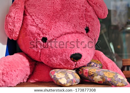 Big Teddy Bear feeling sad. Concept about loneliness and waiting for someone.