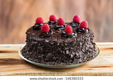 Chocolate cake with raspberries topping