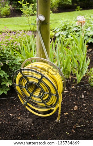 Garden hose reel and nozzle English garden