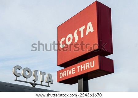 NOTTINGHAM, ENGLAND - FEBRUARY 20: Costa Coffee shop and drive-thru signage at Castle Marina Retail Park, Castle Bridge Road, Nottingham, NG7 1GX, United Kingdom. On 20TH February 2015.