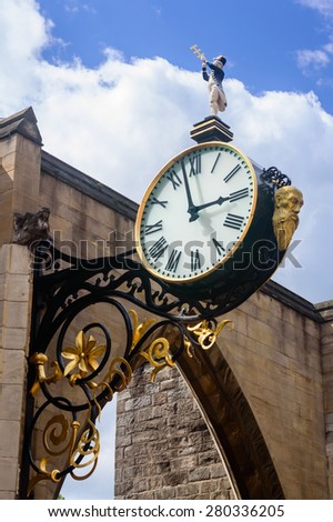 YORK, ENGLAND - MAY 20: The famous double-faced clock outside of St. Martin-Le-Grand Church, on Coney Street. In York, England, on 20th May 2015.