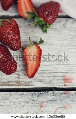 Strawberry on rustic background