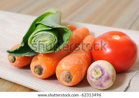 close up of isolated vegetables on wood table