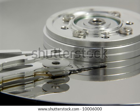 Closeup of computer hard drive disc. Read write head