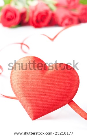 Bouquet of red roses and heart. Valentines day card.