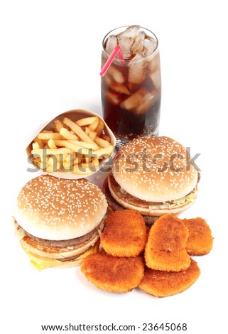 Hamburger, french fries, chicken nuggets and cola on a white background