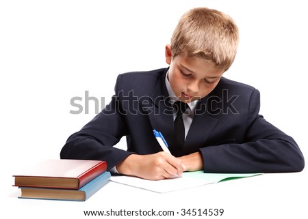 The boy, books and exercise book on a white background. Concept for 