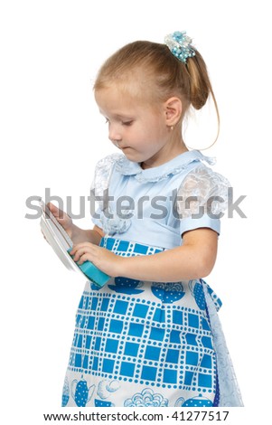 The little girl diligently washes with a sponge a plate on a white background. The mum's assistant.