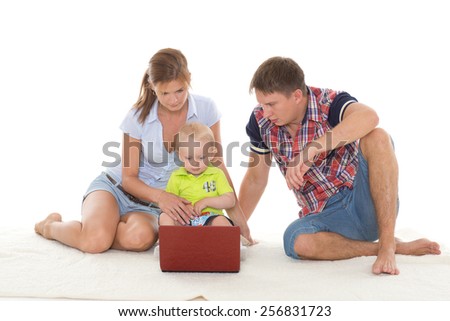 Happy family with notebook on a white background.
