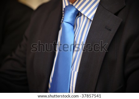 closup with striped shirt striped tie with striped shirt. closup with striped shirt