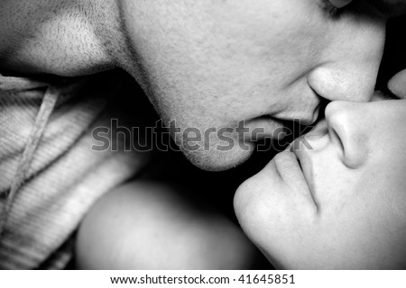 people kissing black and white. stock photo : lack and white