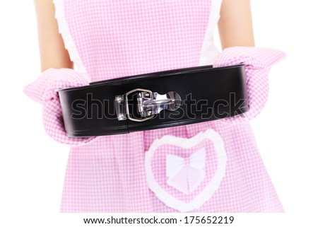 A midsection of a retro woman holding a cake tin over white background