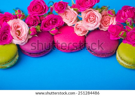 spring berry color macaroons with roses background for valentines mother day easter with love