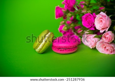 berry spring color macaroons with roses green background for valentines mother woman day easter with love