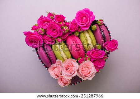 heart shape box with berry pink spring color macaroons background for valentines mother day easter with love