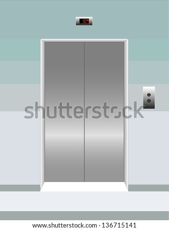 Front view of a modern elevator with closed doors in lobby