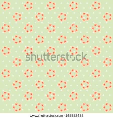 Retro background as old fabric with wreath of flowers on polka dot background