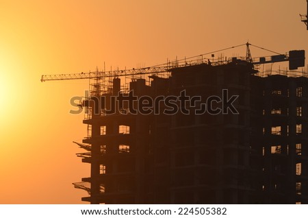 sunset, construction site and colorful sky, end of day