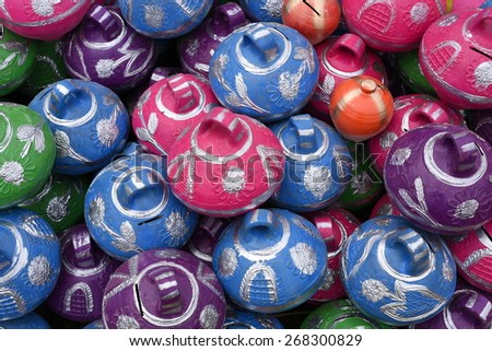 Pretty Colorful clay pot piggy banks, whole background