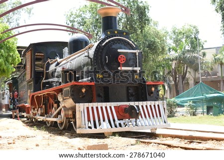 Editorial, New Delhi, India, National Rail Museum: focuses on the rail heritage of India it opened on the 1 February 1977, a must see place in New Delhi, a female tourist and trees in backdrop