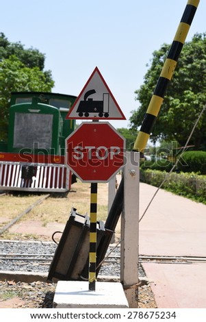 Stop Sign at Rail crossing with stop and rail sign