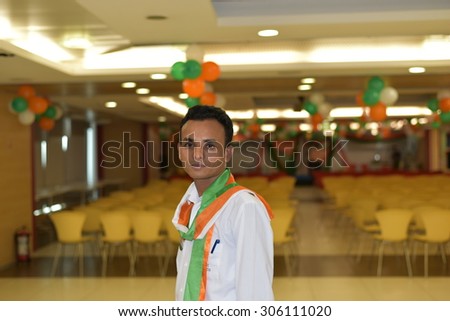 Young Indian Man wearing Indian Flag on the occasion of 69th Independence Day Celebration