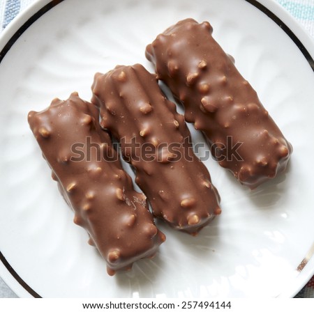 Sticks of chocolate waffles with puffed rice