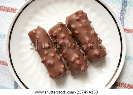 Sticks of chocolate waffles with puffed rice
