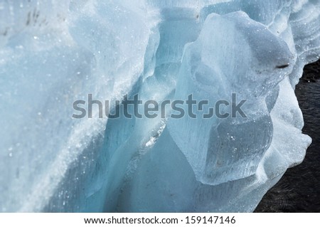 Summer, glaciers, ice. Riverbed Yakut rivers ice does not melt even in summer.
