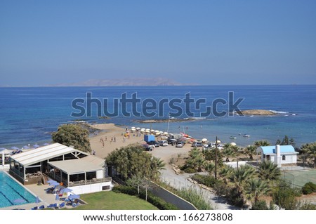 The Greek island of Crete is situated in the Mediterranean sea. Rocky shore of the sea.