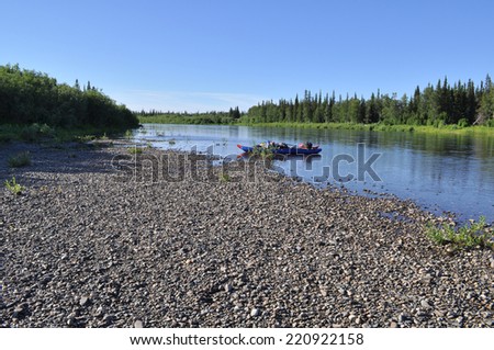 River Polar Urals on a Sunny summer day. Catamaran for rafting on the taiga river.