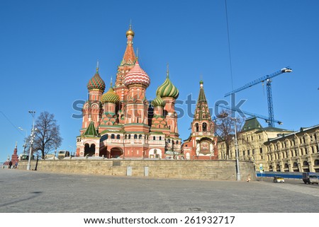 Domes of St. Basil\'s Cathedral on red square. The St. Basil\'s Cathedral in Moscow\'s red square, illuminated by the sun.