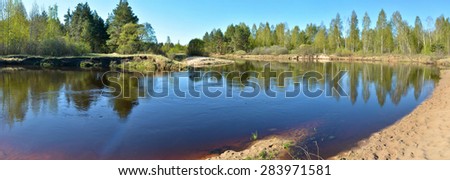 Panoramic landscape forest river in spring season in the national Park of Russia.