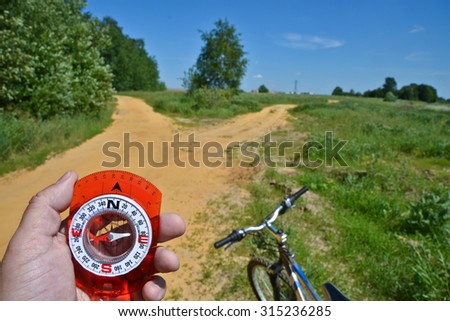 Orientation during a bike ride in rural areas. The choice of the path at the fork.