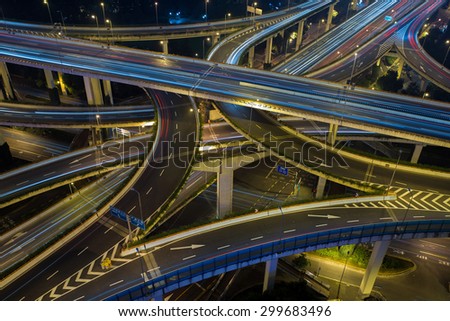 Modern city traffic road at night. Transport road junction.