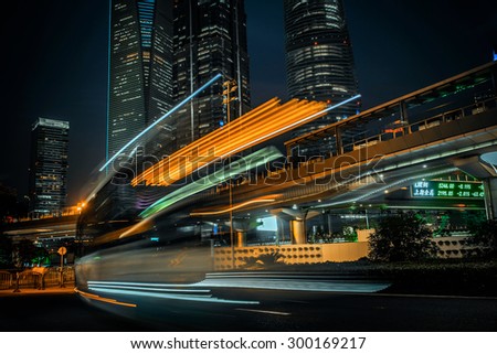 Modern city at night. Shanghai Lujiazui finance street.
