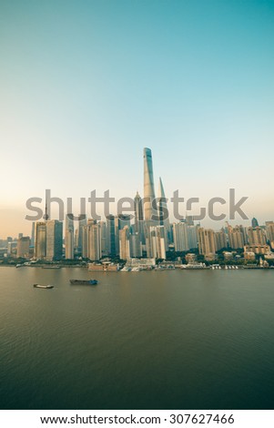 Panorama view of Shanghai city scape in sunset time. Aerial view