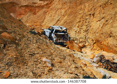 Car that blew the water flow down the river bed in wadi kelt