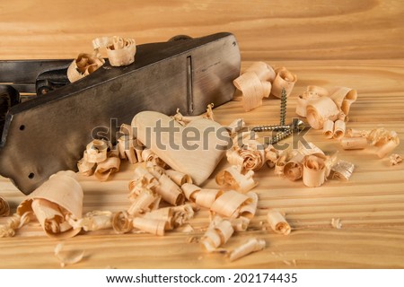 Wood plane and shavings with hand made wood heart