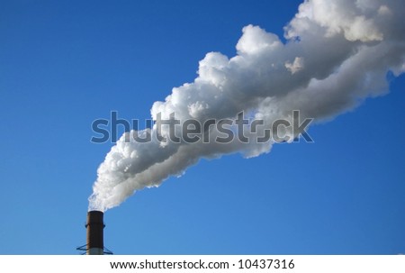Pipe, smoke on a background blue sky.