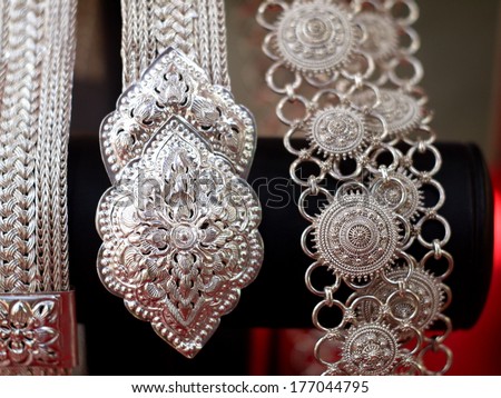 Beautiful nice shiny silver detailed handcraft belt as vintage fashion accessories for sale in a jewelry shop in Thailand