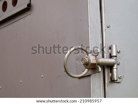 security door lock made of bolt and round metal ring for using with steel door of a large solar powered oven