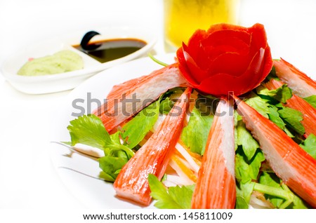 crab stick meal, decorate crab stick in white plate Japanese food.