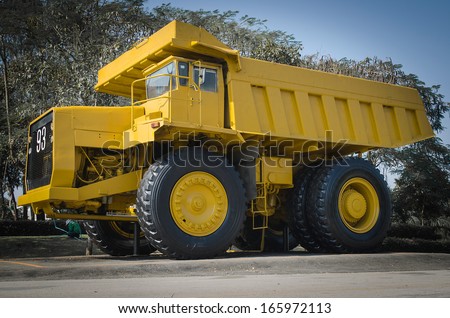Large haul truck ready for big job in a mine. Low saturation and