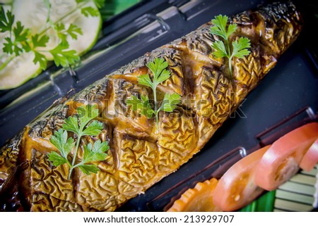 Grill fish with sauce , Saba fish teriyaki sauce japanese food with dark brown wood pattern