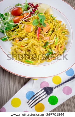 Pan fried noodle with crab stick.