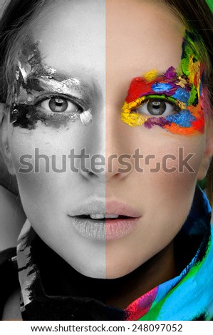 Close up of a face of a girl with creative visage. Face art.